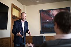 Mark Wojnarek makes point in Browning Conference room