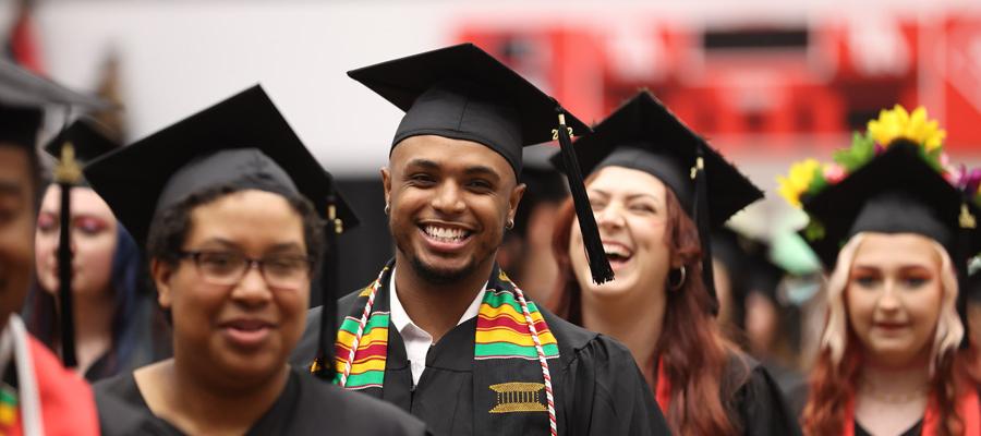 Student smiling at graduation